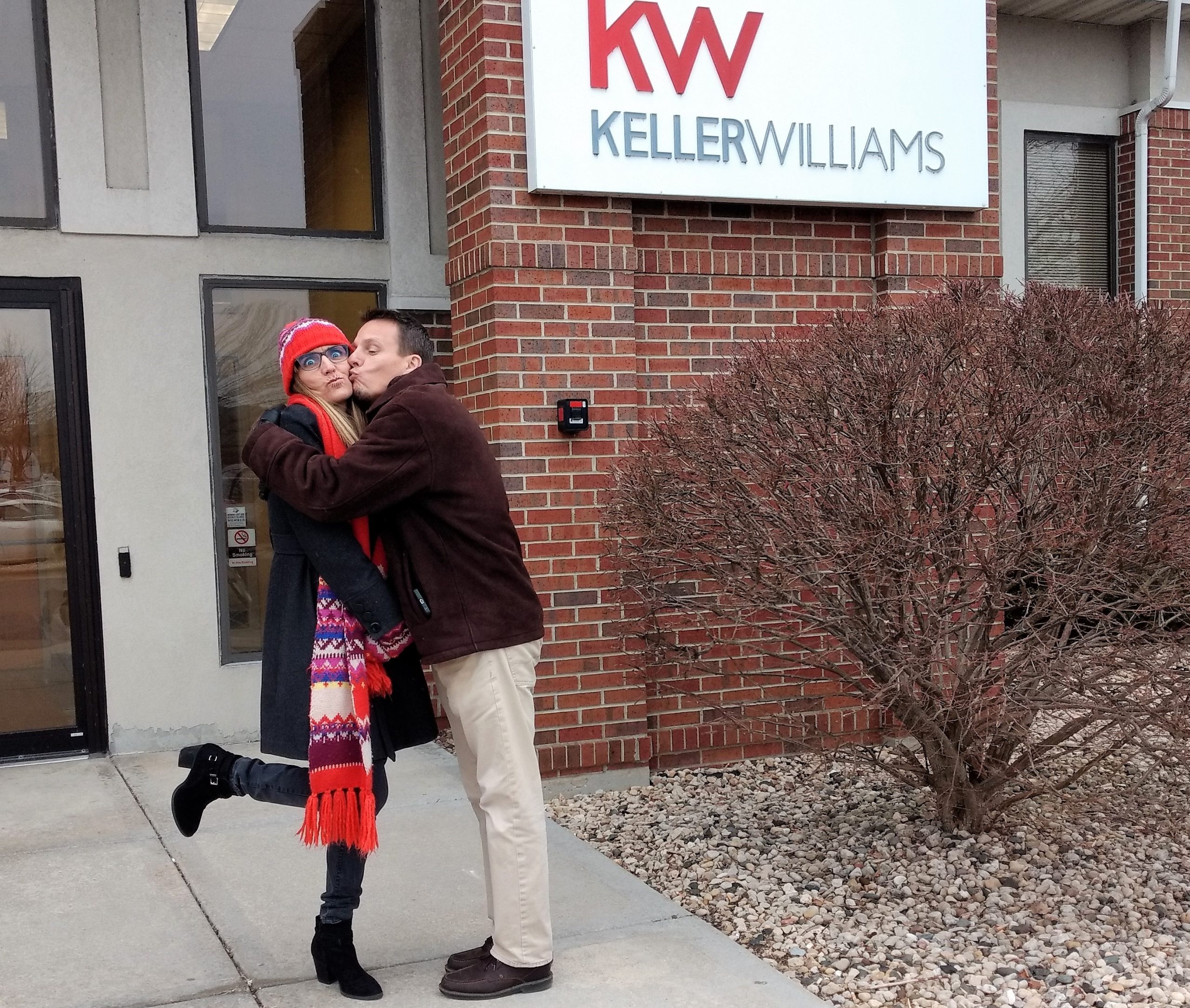 Kevin and Renee in front of KW building